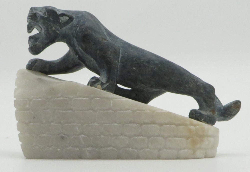 Hand Carved Stone Jaguar on Inca Ruins Sacred Valley Peru
