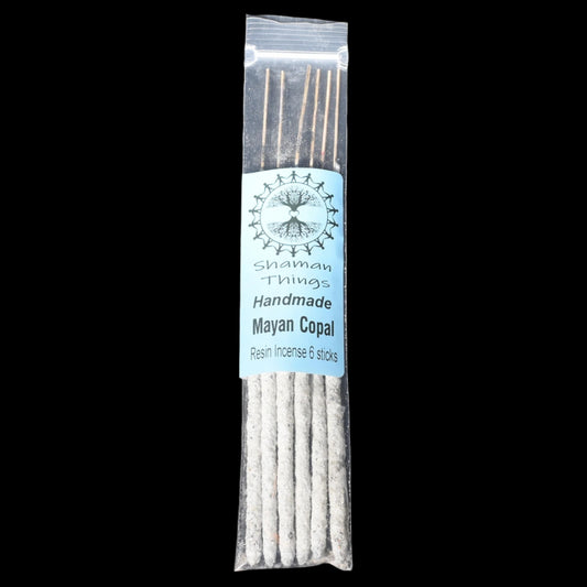 Pack of Mayan Copal incense sticks with a label on a black background